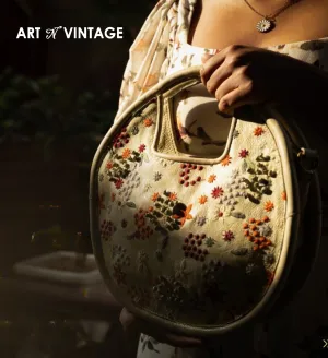 Floral Bliss: Round L.Green Leather Handbag with Flower Embroidery