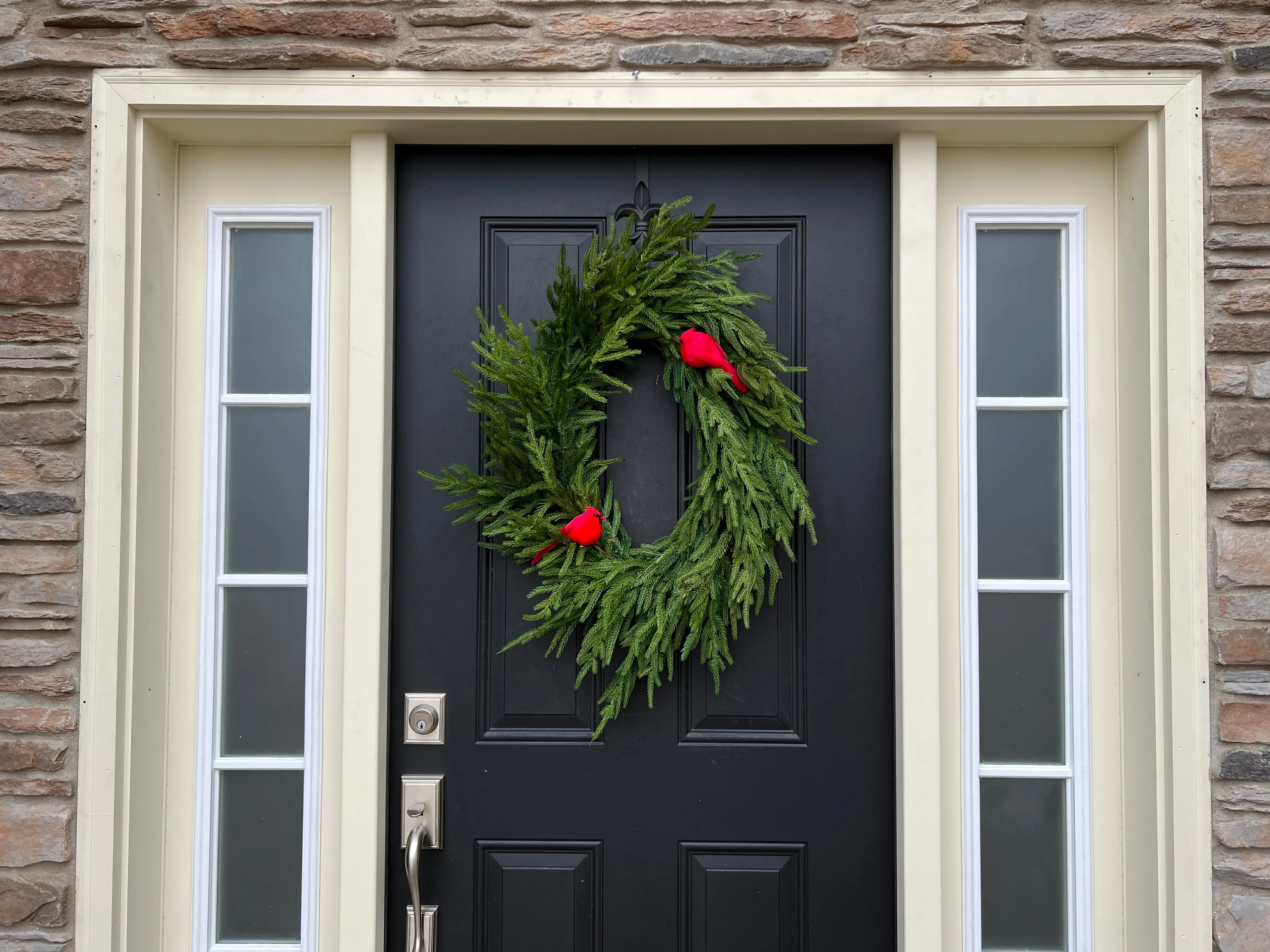 Natural Touch Norfolk Pine Wreath with Red Cardinals