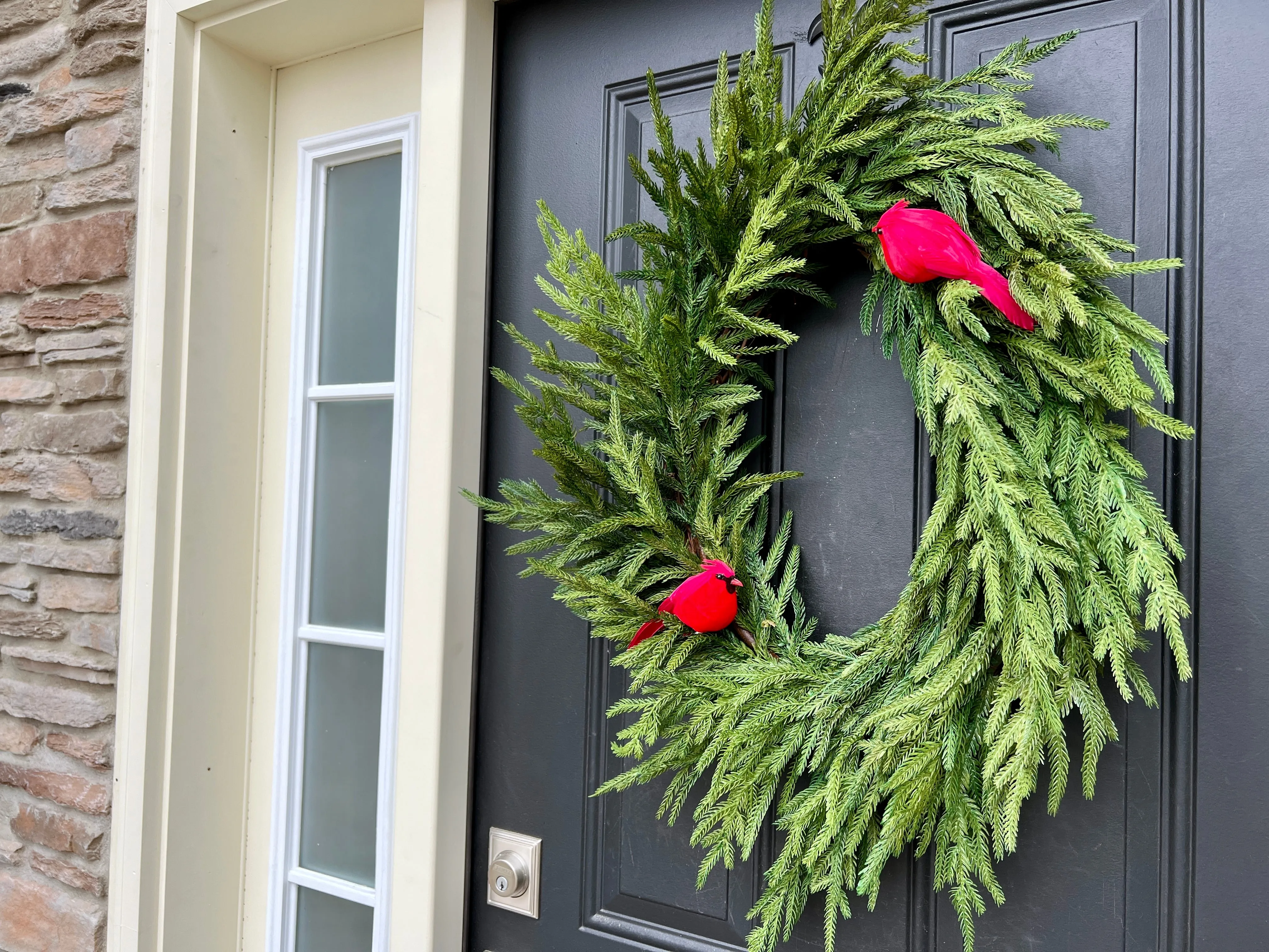 Natural Touch Norfolk Pine Wreath with Red Cardinals