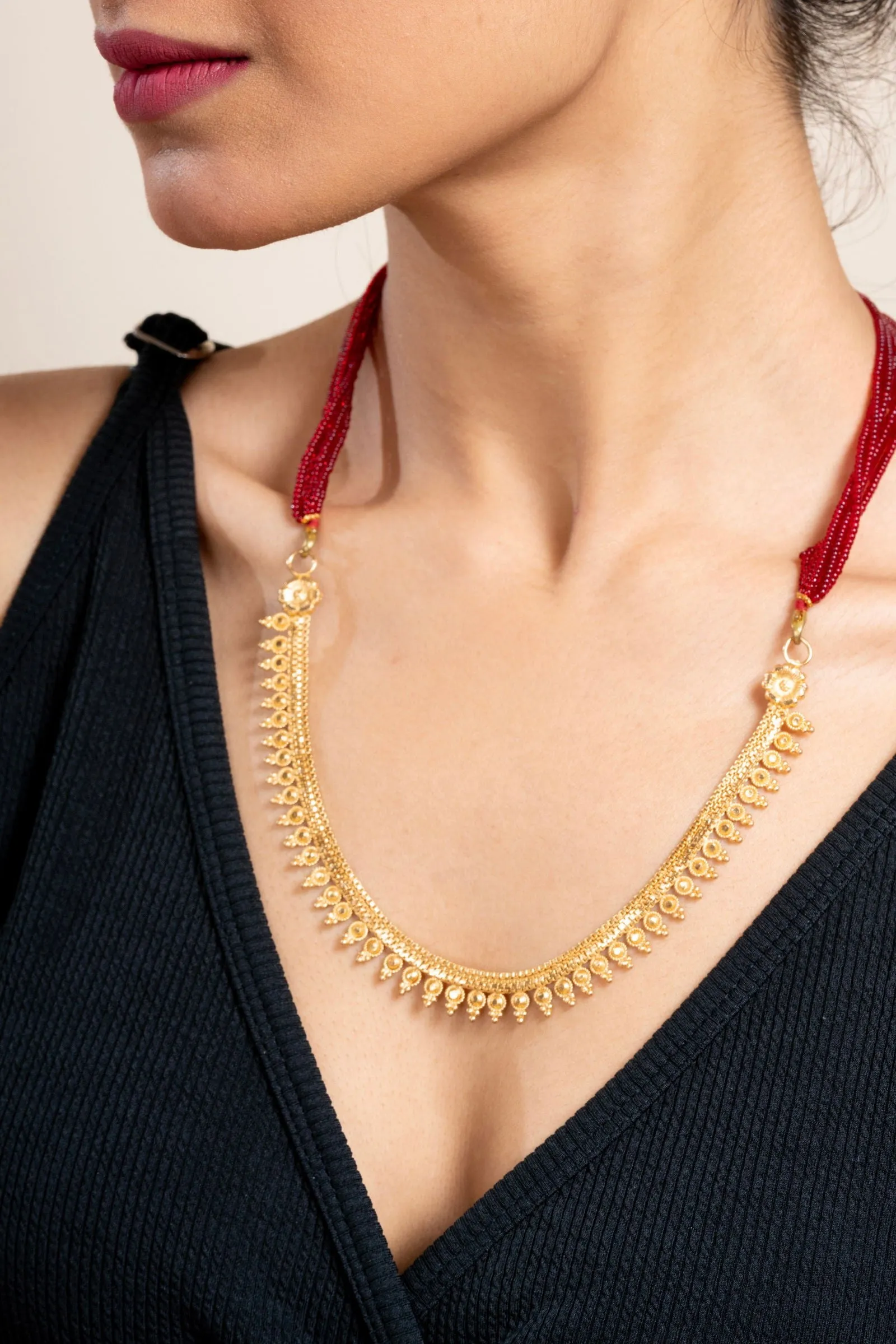 Unique Gold Plated Floral Design Statement Necklace with Red Tassel Dori